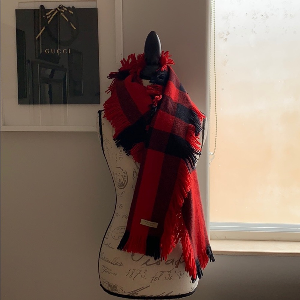 Authentic Burberry plaid wool scarf used like new.